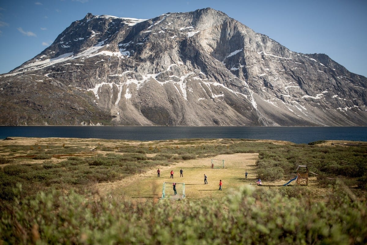 The soccer or football field at Qooqqut in the fjord near Nuuk backcountry in Greenland - Photo by Mads Pihl - Visit Greenland